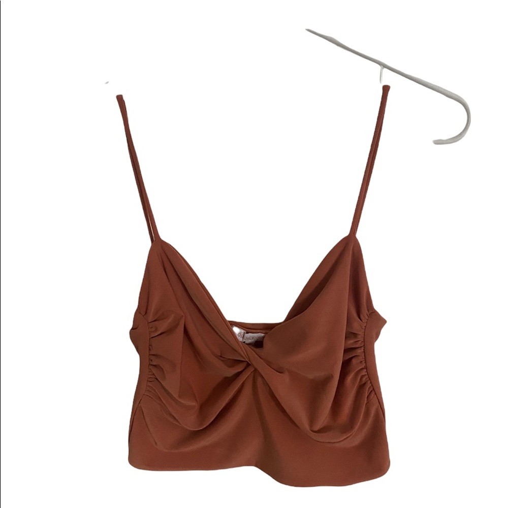 Super cute orange tank. Really flattering. size Medium.